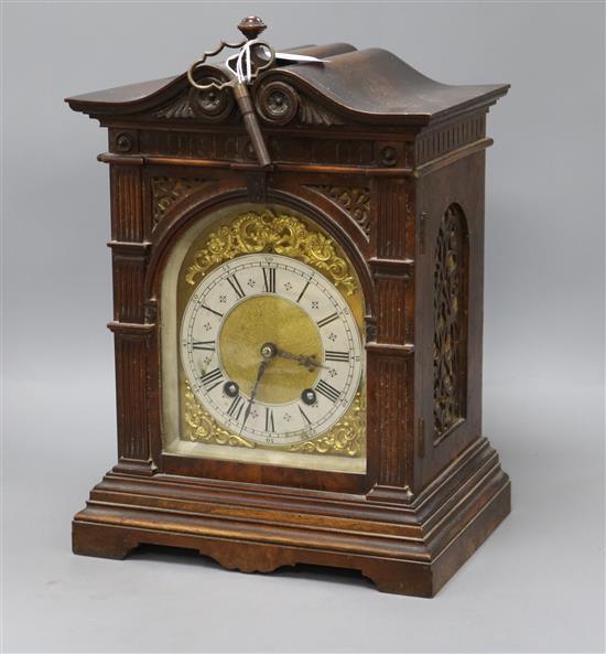 A German mahogany and walnut mantel clock height 35cm